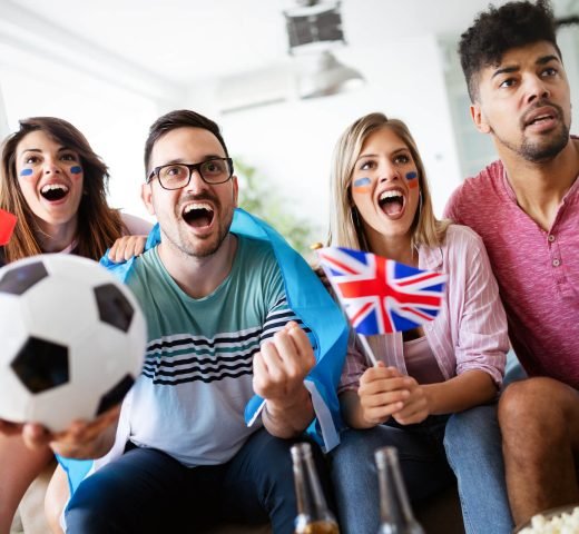 group-of-multi-ethnic-people-celebrating-football-2021-08-28-19-18-20-utc.jpg